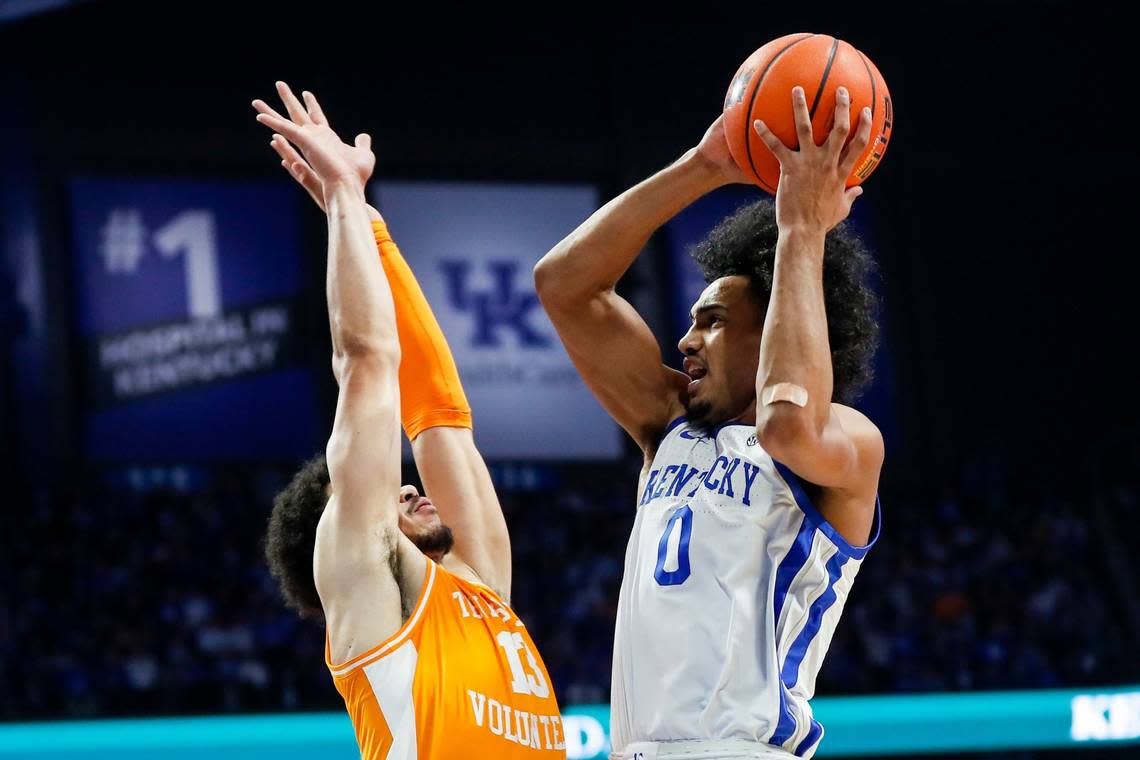 Kentucky’s Jacob Toppin (0) drives to the basket against Tennessee’s Olivier Nkamhoua (13) during Saturday’s game at Rupp Arena.