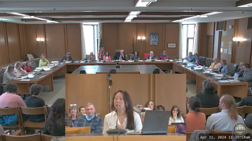 Tina Kim Philibotte, the Chief Equity Officer in the Manchester School District, holds back tears during her testimony against SB 341 in front of the House Education Committee Monday.