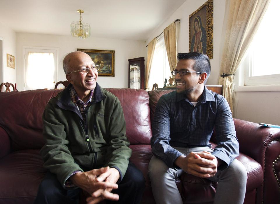 Yves Gomes, a student at the University of Maryland, who's parents were deported, right, talks to his great uncle Henry Gomes, in his great uncle's house where he lives, in Silver Spring, Md., Friday Jan. 17, 2014. Gomes says he considers himself one of the lucky ones _ lucky, at least, among the so-called “DREAMers.” Even though his parents were deported and his legal status was once in limbo, today the 21-year-old Indian native attends the University of Maryland paying in-state tuition. ( AP Photo/Jose Luis Magana)