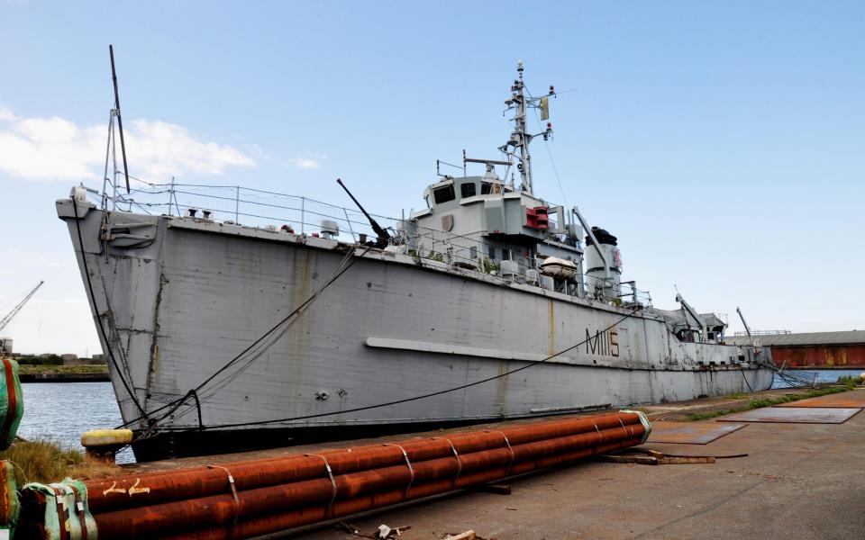 A dilapidated HMS Bronington at Birkenhead Docks before it sank at its moorings six years ago - Alamy