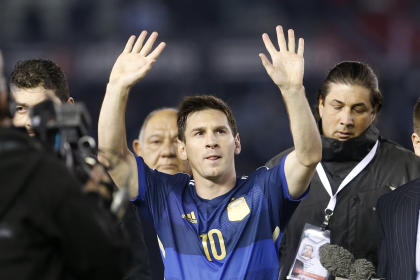 Lionel Messi waves to fans at the end of an international friendly against Trinidad and Tobago on June 4. (AP)