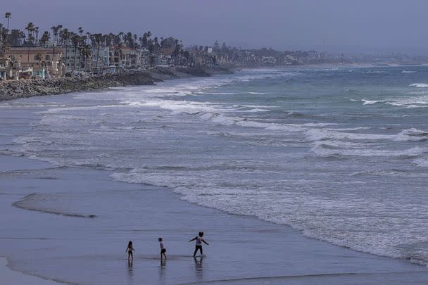 PHOTO: FILE - Kids play on the beach in Oceanside, Calif., Feb. 21, 2023. (Mike Blake/Reuters, FILE)