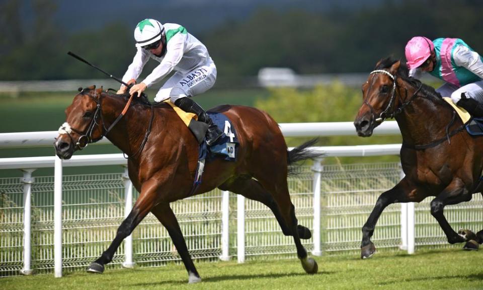 Khalifa Sat holds off the challenge of Emissary at Goodwood last month.