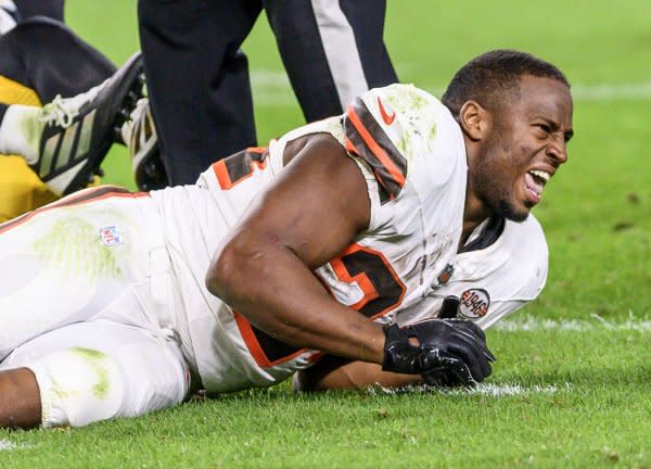Cleveland Browns running back Nick Chubb looks to the sidelines while in pain after he was injured against the Pittsburgh Steelers on Monday at Acrisure Stadium in Pittsburgh. Photo by Archie Carpenter/UPI