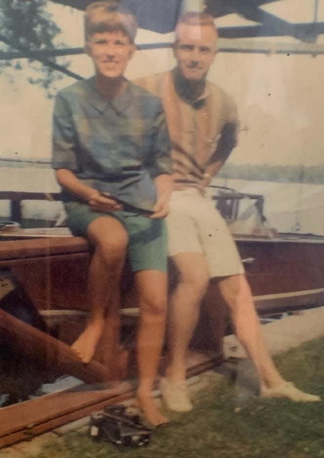 Ginger Rowe and Bud Long take a picture near her grandfather’s boat around July 1965. They married two years later and still own the boat.