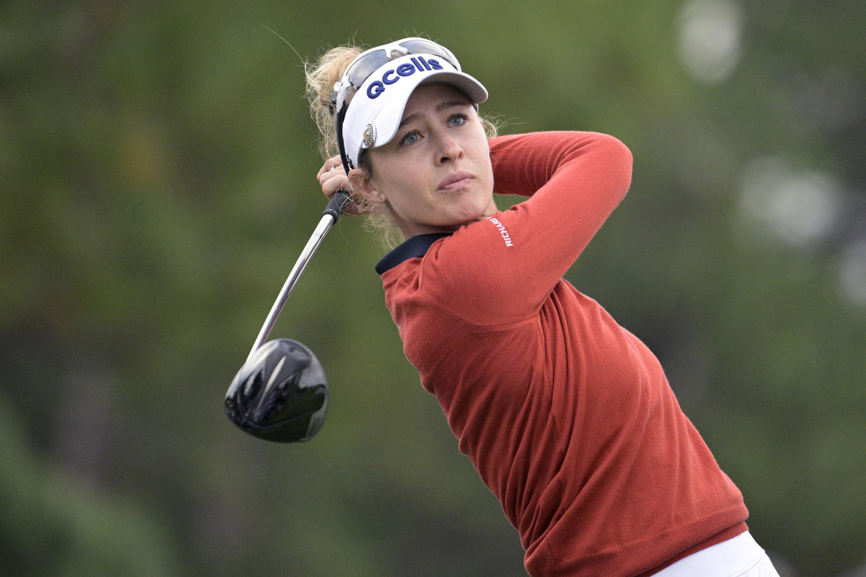 Nelly Korda watches her tee shot on the 18th hole during the final round of the LPGA Pelican Women's Championship golf tournament at Pelican Golf Club, Sunday, Nov. 13, 2022, in Belleair, Fla. (AP Photo/Phelan M. Ebenhack)