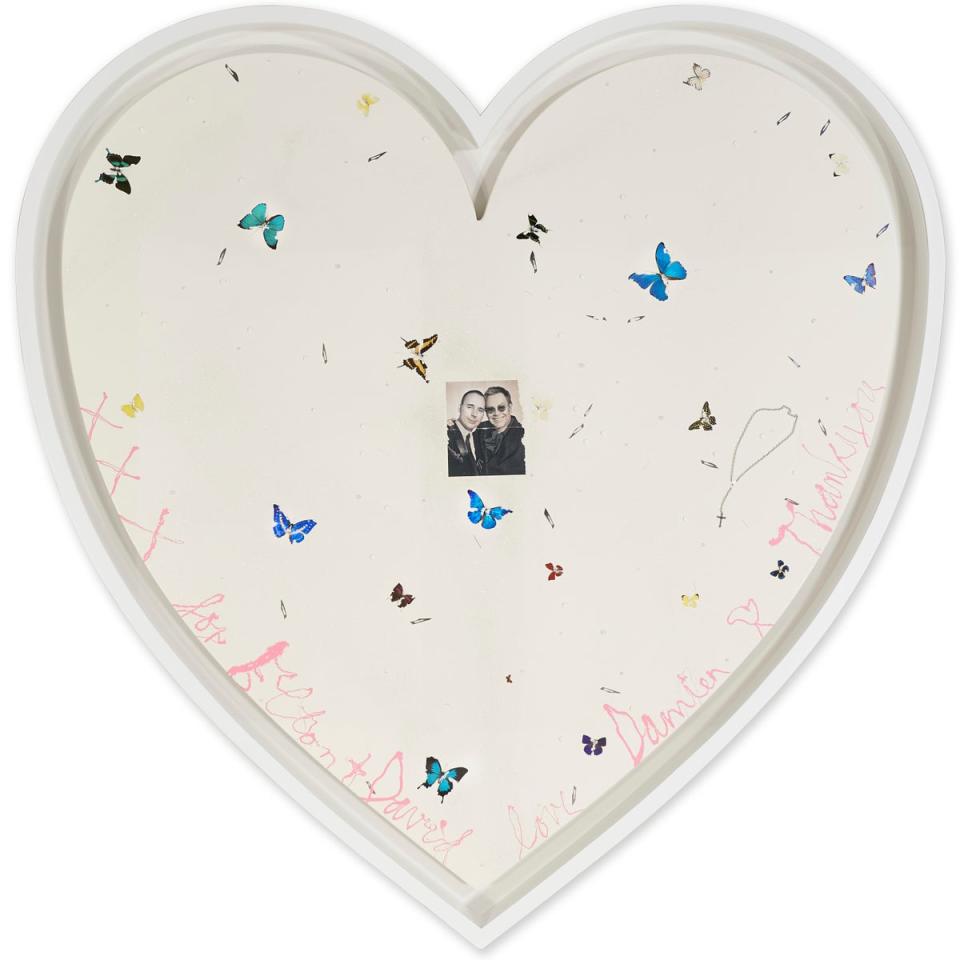 A custom Damien Hirst painting titled Your Song, signed and inscribed “xxx for Elton + David love Damien”, was gifted to the couple by the artist in 2008 and has an estimated price tag of $350,000 to $450,000 (£280,000 to £360,000) (PA)