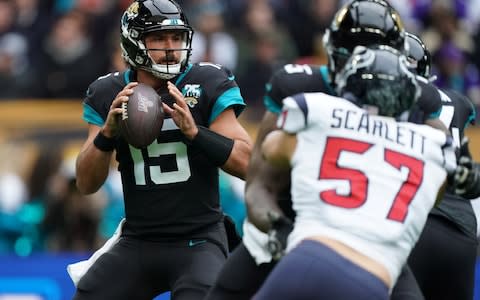 Jacksonville Jaguars quarterback Gardner Minshew (15) throws a pass in the first half against the Houston Texans during an NFL International Series game at Wembley Stadium - Credit: USA Today
