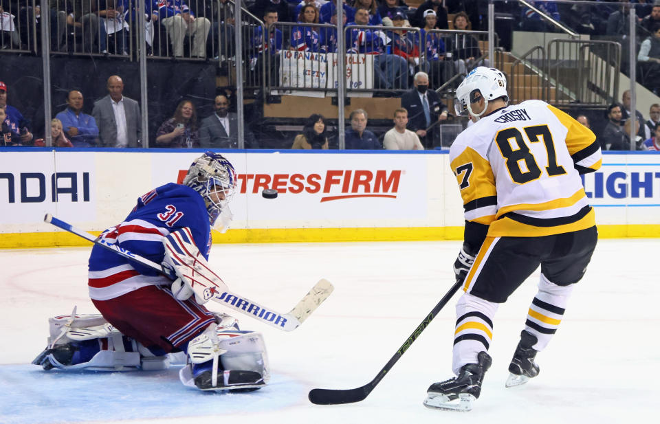 NEW YORK, NEW YORK - MAY 03: Sidney Crosby #87 of the Pittsburgh Penguins looks for the rebound from Igor Shesterkin #31 of the New York Rangers during the second overtime period in Game One of the First Round of the 2022 Stanley Cup Playoffs at Madison Square Garden on May 03, 2022 in New York City. (Photo by Bruce Bennett/Getty Images)