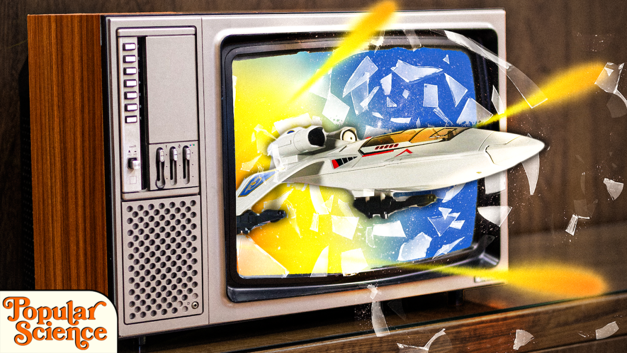 a spaceships breaks through an old tv with glass flying