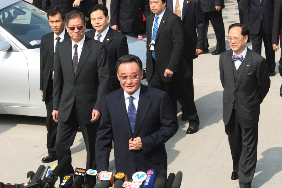 Chief Executive Donald Tsang( Right ) and Chairman of the Standing Committee of the National People's Congress Wu Bangguo meet the media in Hong Kong International Airport, Chek Lap Kok. 02Dec06. Wu Bangguo will officiate at the ITU TELECOM WORLD 2006 opening ceremony and welcome reception. 02 December 2006.  ***NOT FOR ADVERTISING USE*** (Photo by David Wong/South China Morning Post via Getty Images)