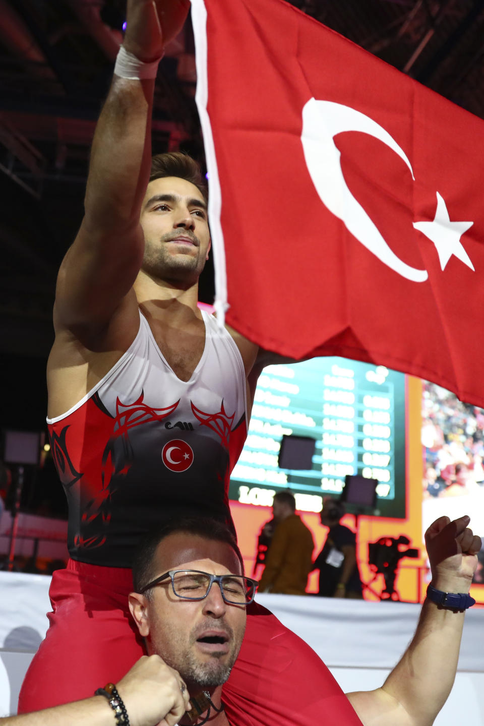 Gold medalist Ibrahim Colak of Turkey celebrates after his performance in the men's rings exercise during the apparatus finals at the Gymnastics World Championships in Stuttgart, Germany, Saturday, Oct. 12, 2019. (AP Photo/Matthias Schrader)