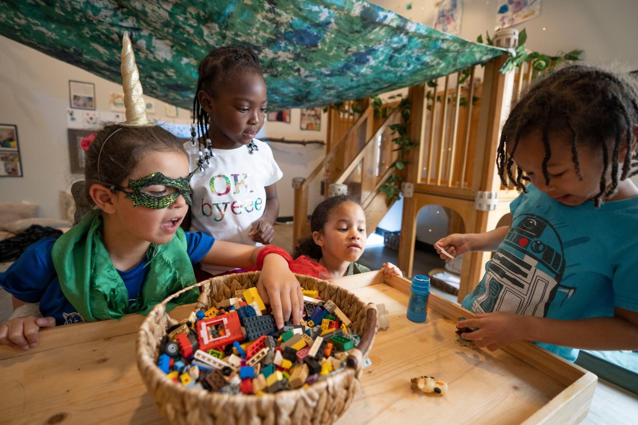 Elena Barragan, 5, Riley Smith, 5, Joshura Davis, 5, and Jayceon Bouchillion, 5, play together at the Urban Sprouts Child Development Center in University City, Mo., on Friday, March 29, 2022.