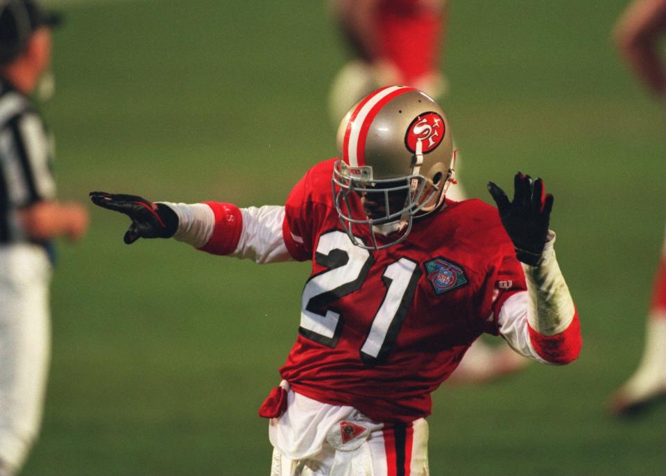 Deion Sanders celebrates a fourth-quarter play as the San Francisco 49ers defeat the San Diego Chargers 49-26 in Super Bowl XXIX at Joe Robbie Stadium in Miami.