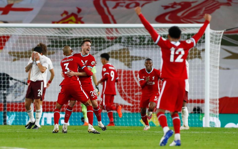 Liverpool's Diogo Jota celebrates scoring their third goal with teammates - REUTERS