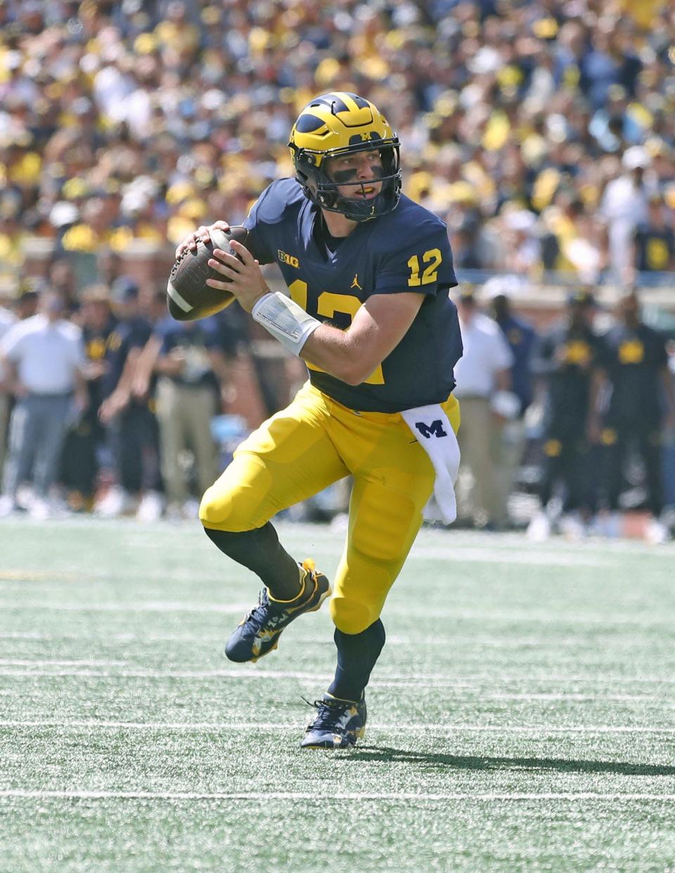 Michigan quarterback Cade McNamara looks to pass against Colorado State during the first half on Saturday, Sept.  3, 2022, in Ann Arbor.