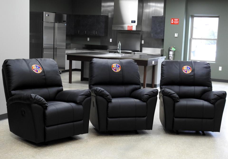 Recliners with the Coshocton County Emergency Medical Services logo on them are in a lounge for employees during down time at the new station.