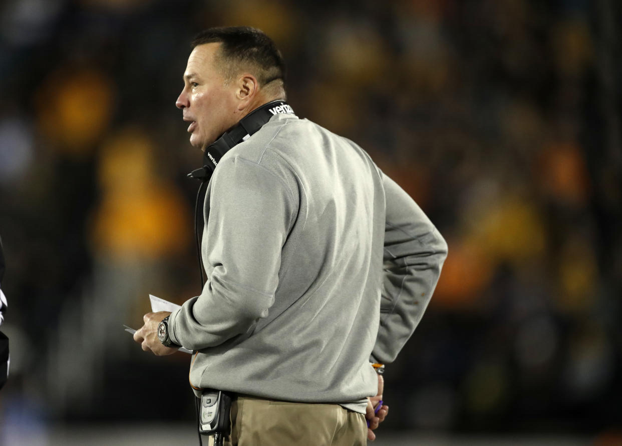 Tennessee head coach Butch Jones watches from the sidelines during the first half of an NCAA college football game against Missouri Saturday, Nov. 11, 2017, in Columbia, Mo. (AP Photo/Jeff Roberson)