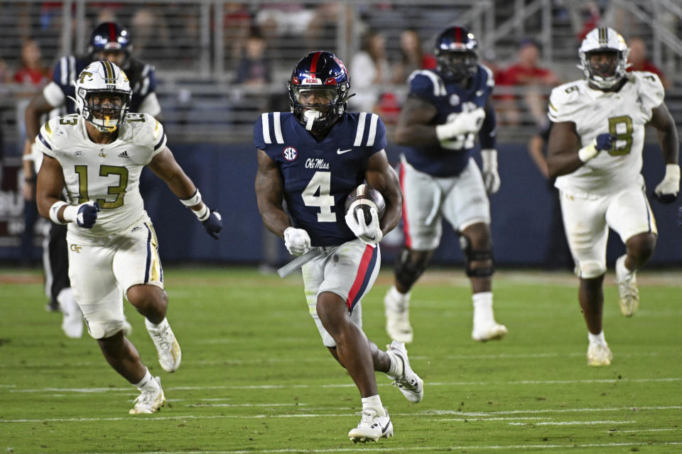 Mississippi running back Quinshon Judkins (4) carries during the second half the team's NCAA college football game against Georgia Tech in Oxford, Miss., Saturday, Sept. 16, 2023. (AP Photo/Thomas Graning)