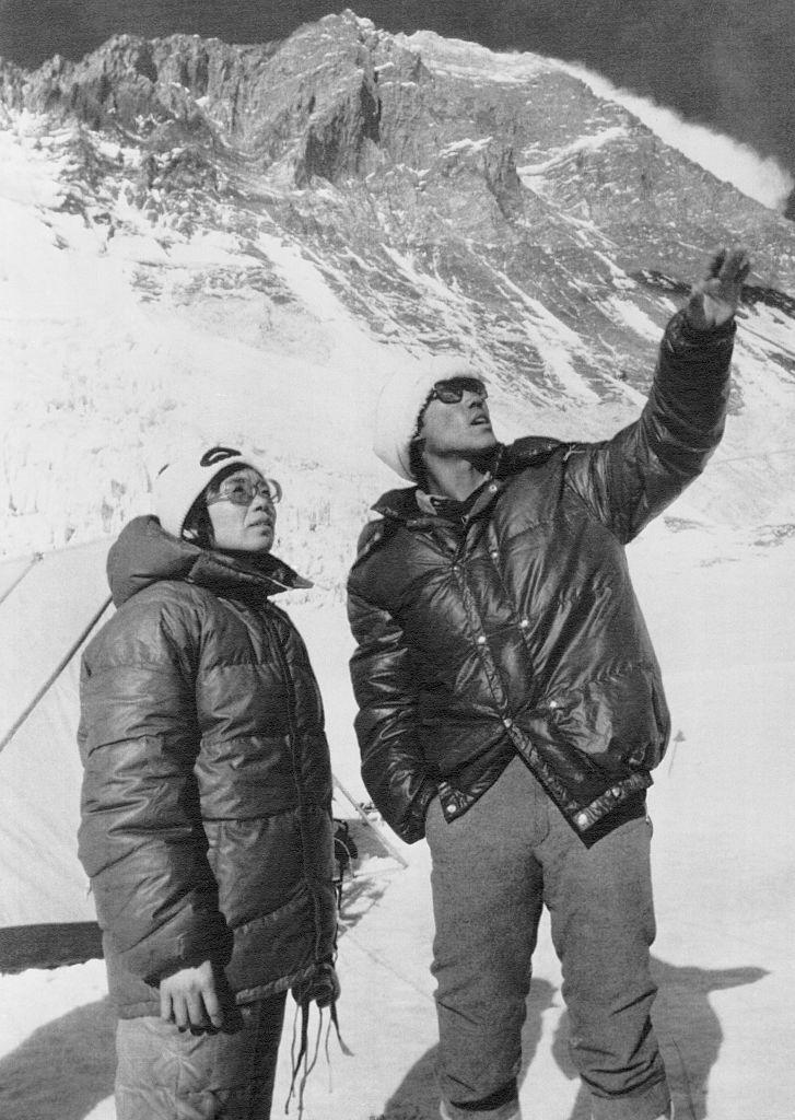 mountain climber junko tabei conversing with sherpa