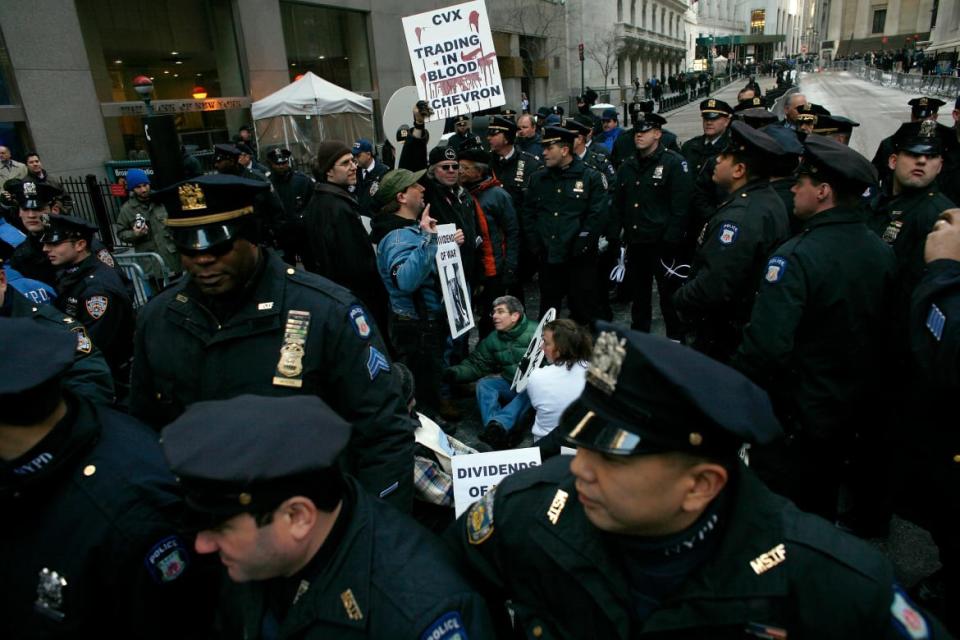 <div class="inline-image__caption"><p>New York City police prepare to arrest a small group of anti-war protesters in front of the New York Stock Exchange, March 19, 2007, in New York City. </p></div> <div class="inline-image__credit">Michael Nagle/Getty Images</div>