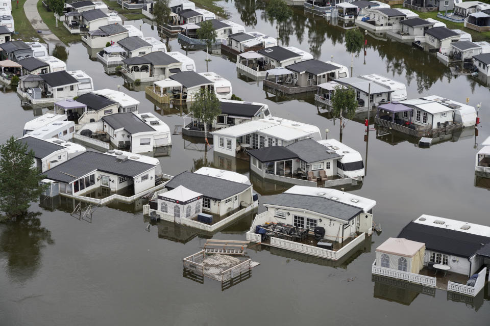 Southeast Norway hit by floodwater, Friday Aug. 11. 2023. More evacuations were being considered Friday in southeastern Norway, where the level of water in swollen rivers and lakes continued to grow after days of torrential rain. (Ole Berg-Rusten/NTB via AP)