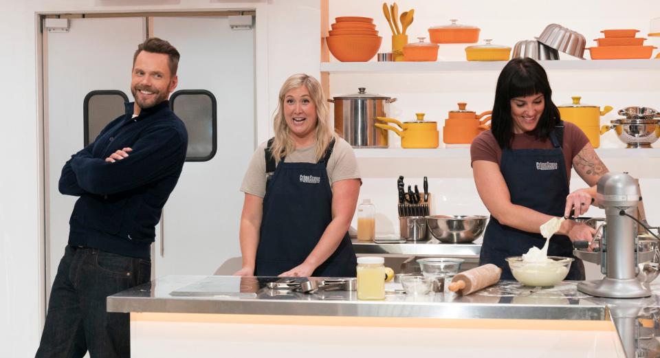 Host Joel McHale, from left, with contestants Kathleen Regelman and Hannah Reyes in the season premiere of the reality cooking competition "Crime Scene Kitchen," which will air at 8 p.m. June 5 on Fox. Regelman and Reyes are the owners of Cup & Cake and Kreger's Bakery in Wausau.