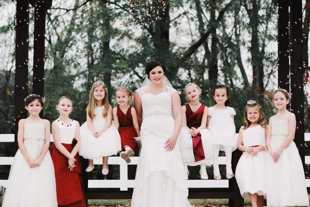 Bride Jennifer Wright, center, and eight of the children from her ceremony. (Photo: Krystal Hammond and Abbgail Pugh)