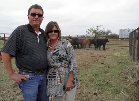 Kevin and Carole O'Daniel stand at their cattle ranch in Seminole, Oklahoma September 30, 2015, where they were hit by rustlers earlier this year. REUTERS/Jon Herskovitz