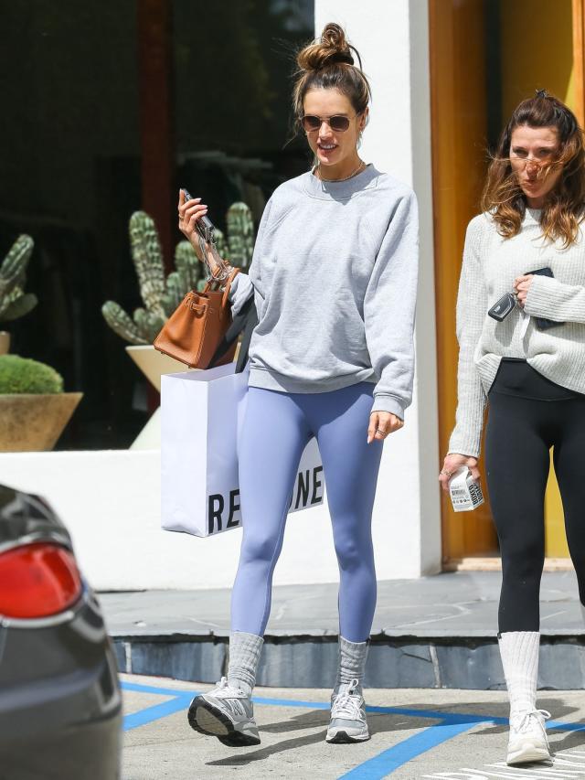 Kendall Jenner sports clingy cranberry leggings for private