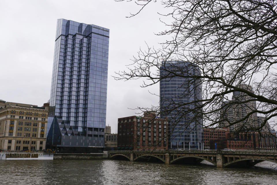 Downtown along the river is seen on Jan. 31, 2024, in Grands Rapids, Mich. Michigan will be a key state in determining the outcome of the upcoming 2024 presidential election, with the economy on the minds of many voters in the state. (AP Photo/Kristen Norman)