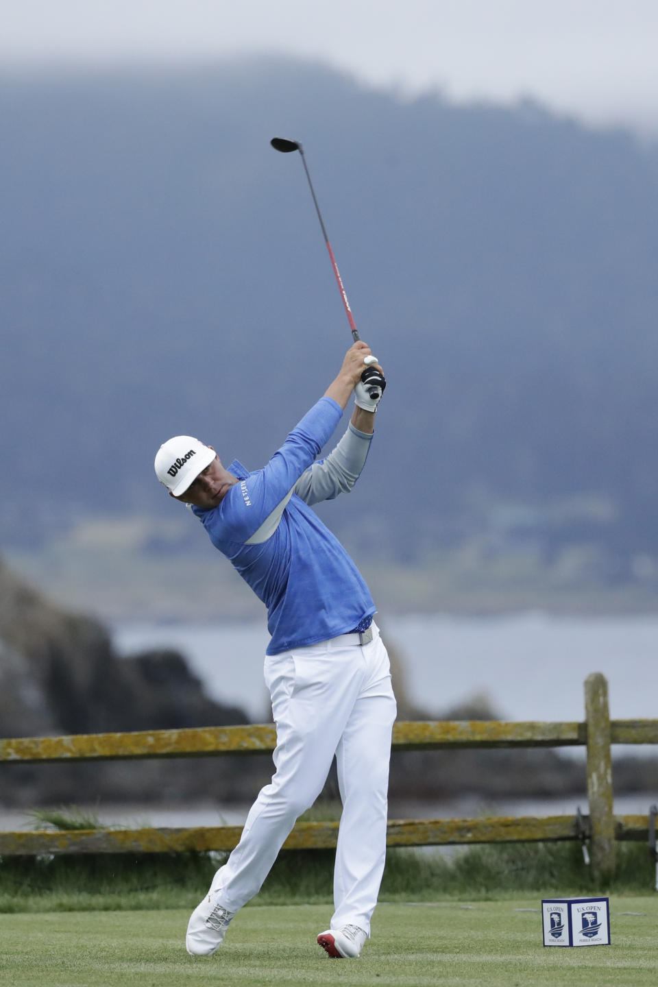 Gary Woodland watches his tee shot on the 18th hole during the third round of the U.S. Open golf tournament Saturday, June 15, 2019, in Pebble Beach, Calif. (AP Photo/Matt York)