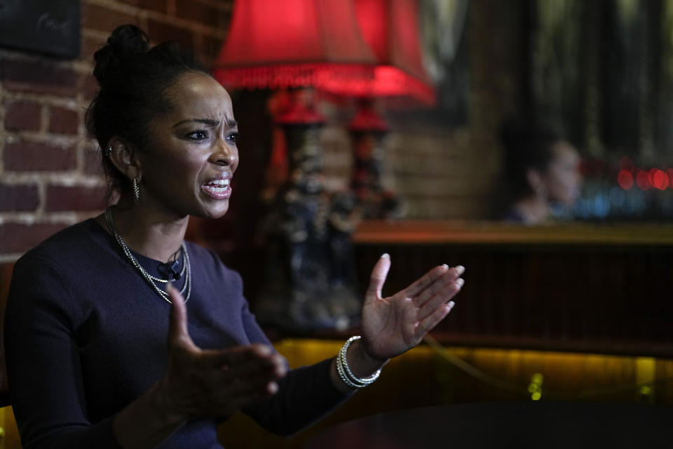 LaJoia Broughton, a 41-year-old small business owner, speaks during an interview at Goat's restaurant and Tavern on Tuesday, May 2, 2023, in Columbia, S.C. Black voters in South Carolina rescued Joe Biden’s bid for the presidency during the 2020 Democratic primary, and he rewarded them by moving the state to the head of the party’s nominating schedule. But two years into his presidency, interviews with more than a dozen Black voters representing a variety of ages and backgrounds reveal mixed views, especially between generations. (AP Photo/Chris Carlson)