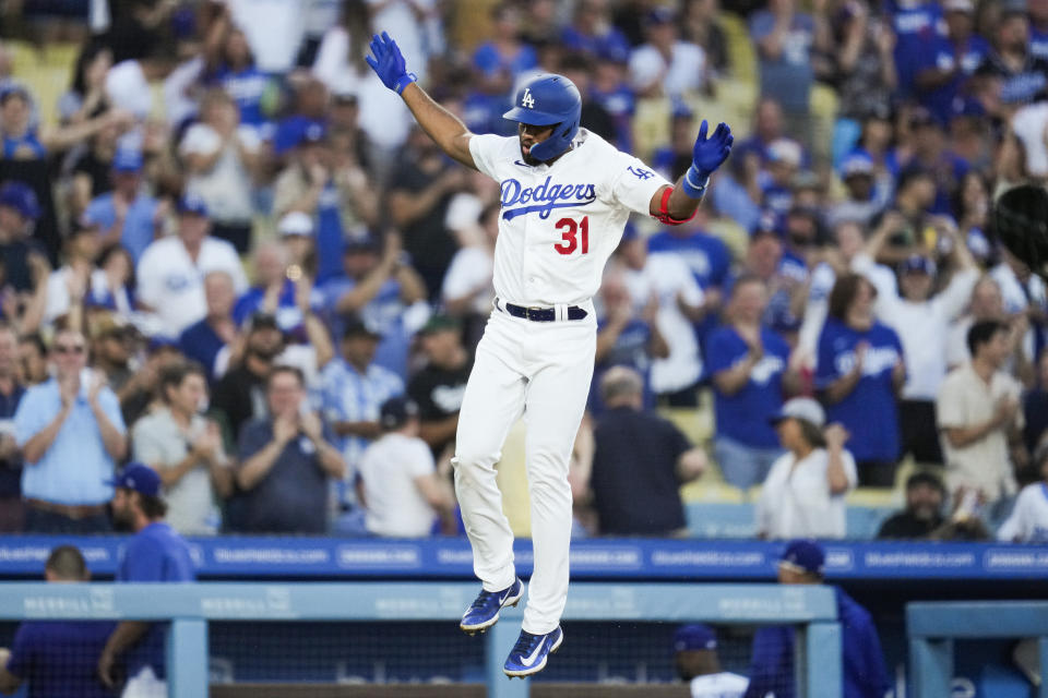Los Angeles Dodgers' Amed Rosario (31) celebrates as he runs the bases after hitting a home run during the second inning of a baseball game against the Oakland Athletics in Los Angeles, Wednesday, Aug. 2, 2023. Will Smith also scored. (AP Photo/Ashley Landis)