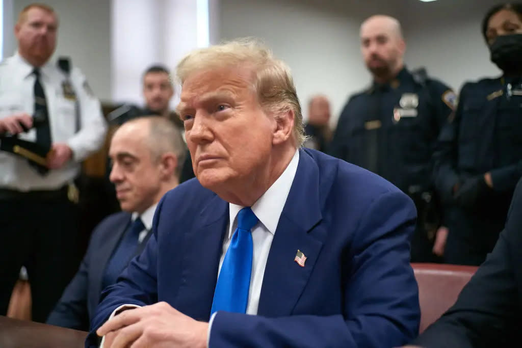 Former U.S. President Donald Trump with attorneys Emil Bove (L) and Todd Blanche (R) attends his at Manhattan Criminal Court on May 3, 2024 in New York City.