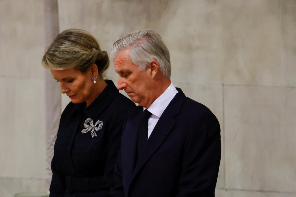 King Philippe and Queen Mathilde of Belgium view the coffin of Queen Elizabeth II, lying in state on the catafalque in Westminster Hall, at the Palace of Westminster, London. Picture date: Sunday September 18, 2022.