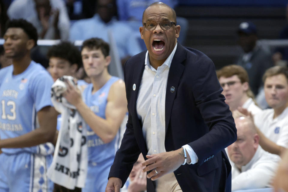 North Carolina head coach Hubert Davis yells instructions to his team during the first half of an NCAA college basketball game against UC Riverside, Friday, Nov. 17, 2023, in Chapel Hill, N.C. (AP Photo/Chris Seward)