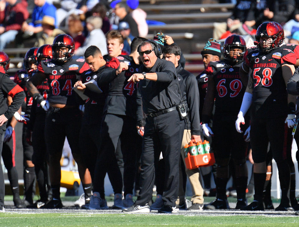ALBUQUERQUE, NEW MEXICO - DECEMBER 21:  Defensive line coach Brady Hoke (C) of the San Diego State Aztects shouts instructions to hsi team during their game against the Central Michigan Chippewas in the New Mexico Bowl at Dreamstyle Stadium on December 21, 2019 in Albuquerque, New Mexico.  (Photo by Sam Wasson/Getty Images)