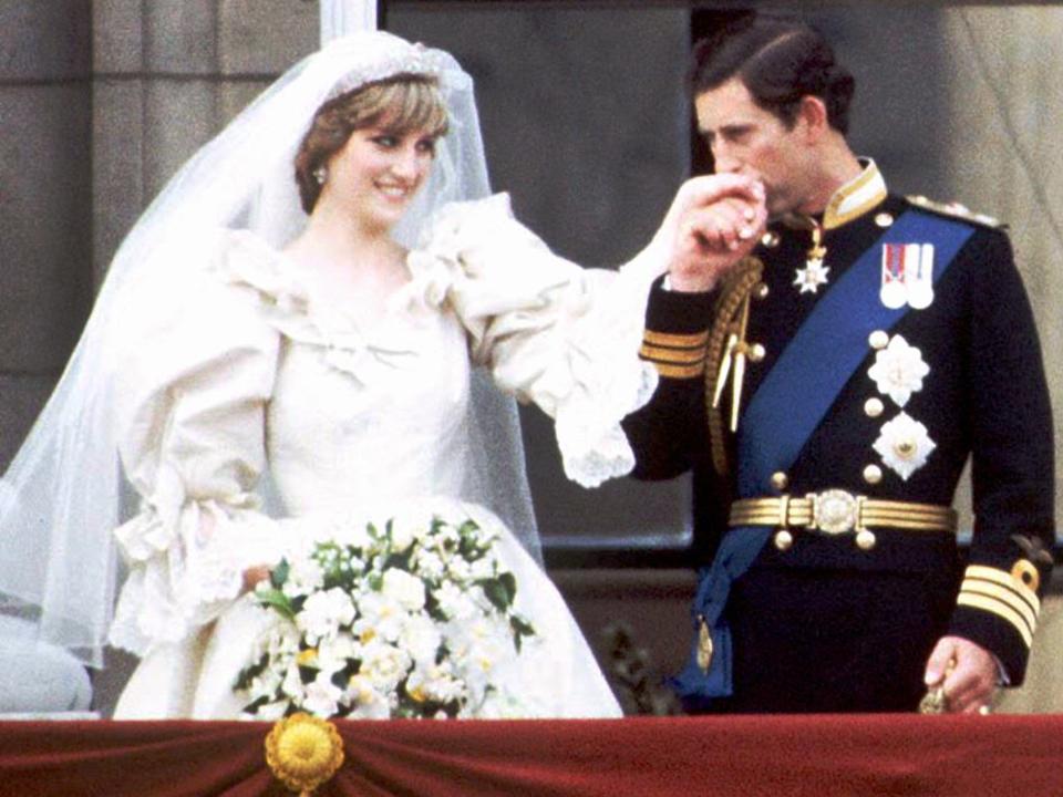 Princess Diana and Prince Charles on the balcony of Buckingham Palace on their wedding day.