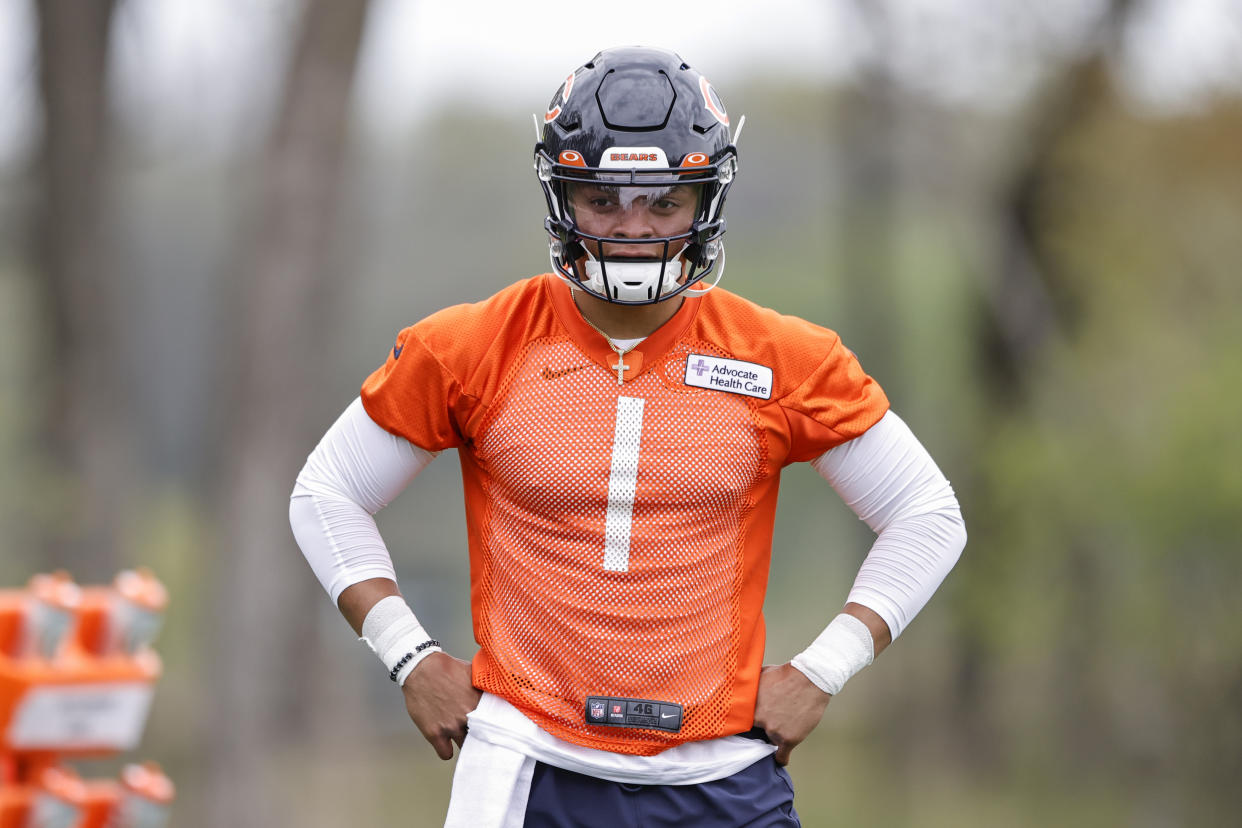 Justin Fields could be the QB savior Chicago Bears fans have longed for. But he'll have to wait to play, and here's why. (Kamil Krzaczynski-USA TODAY Sports)