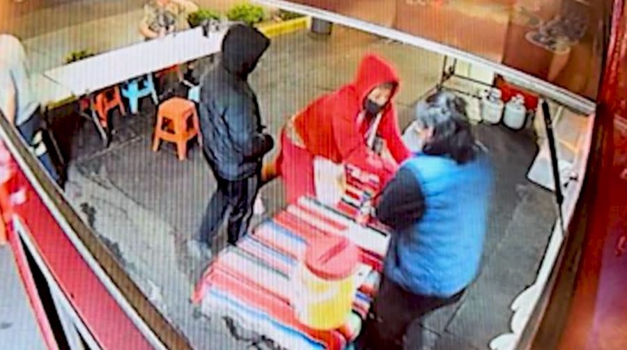 The moment two robbers tried grabbing cash from Erick Flores outside the Los Bros Tacos Truck in Long Beach on May 2, 2024. (Los Bros Tacos)