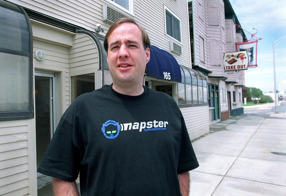 Shawn’s uncle, John Fanning, in front of the storefront on Nantasket Beach, MA, where they started Napster. (Credit: Tom Herde/The Boston Globe via Getty Images)