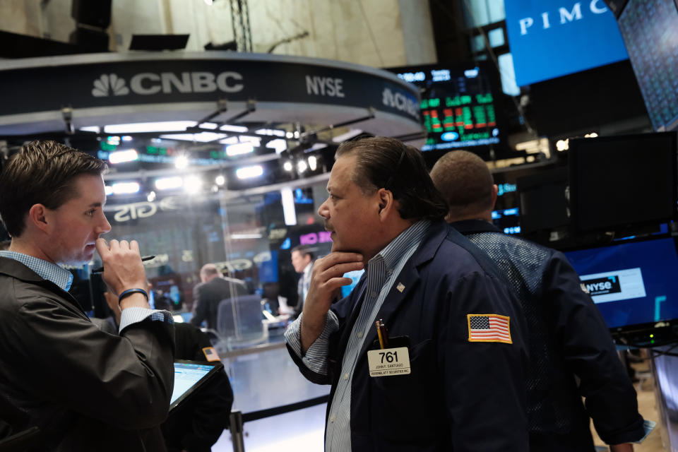 NEW YORK, NEW YORK - JUNE 14: Traders work on the floor of the New York Stock Exchange (NYSE) on June 14, 2022 in New York City. The Dow was up in morning trading following a drop on Monday of over 800 points, which sent the market into bear territory as fears of a possible recession loom. (Photo by Spencer Platt/Getty Images)