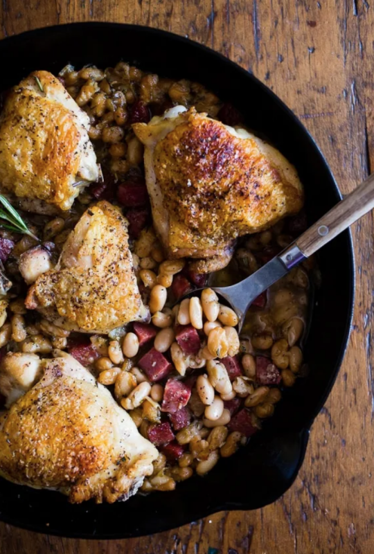 <p>Nutmeg Nanny</p><p>This chicken cannellini bean skillet is the perfect cozy winter meal you crave. Delicious white beans cooked with cubed sausage, onions and rosemary and topped with super crispy chicken thighs. This dish is hearty, delicious and full of flavor!</p><p><strong>Get the recipe: <a href="https://www.nutmegnanny.com/chicken-cannellini-bean-skillet/" rel="nofollow noopener" target="_blank" data-ylk="slk:Chicken Cannellini Bean Skillet;elm:context_link;itc:0;sec:content-canvas" class="link "><em>Chicken Cannellini Bean Skillet</em></a></strong></p>