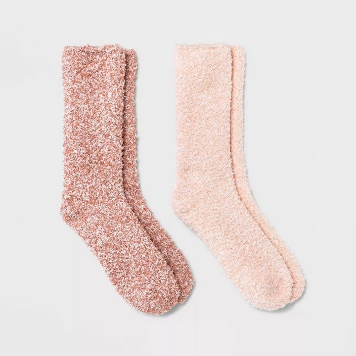 the two socks in different shades of pink