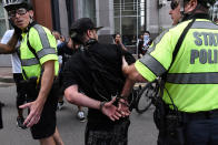 <p>A counter protester is detained by Boston Police outside of the Boston Commons and the Boston Free Speech Rally in Boston, Mass., Aug. 19, 2017. (Photo: Stephanie Keith/Reuters) </p>