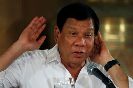 Philippine President Rodrigo Duterte speaks during a news conference at the presidential palace in Manila, Philippines March 13, 2017. Picture taken March 13, 2017. REUTERS/Erik De Castro