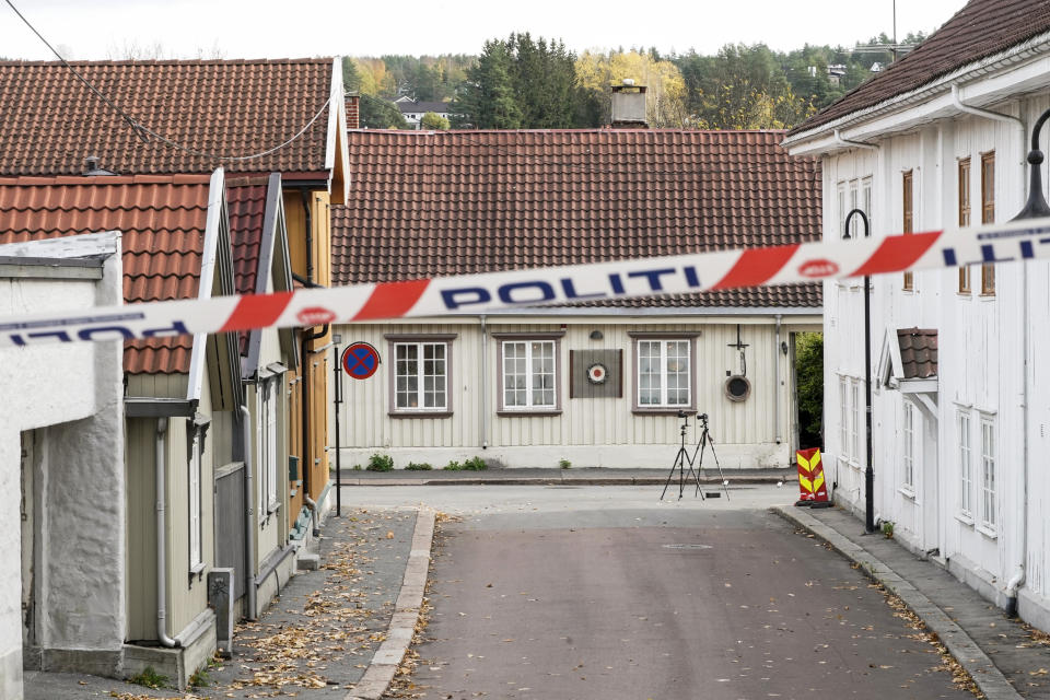 The cordoned-off area of the scene involved in the bow and arrow attack, in Kongsberg, Norway, Friday, Oct. 15, 2021. The suspect in a bow-and-arrow attack that killed five people and wounded three in a small Norwegian town is facing a custody hearing Friday. He won’t appear in court because he has has confessed to the killings and has agreed to being held in custody. (Terje Pedersen/NTB via AP)