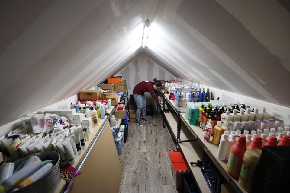 Felicia Tulak, with The Other Side Academy, organizes supplies in Salt Lake City on Wednesday, March 29, 2023. The organization works with former prisoners hoping to rehabilitate their lives. | Jeffrey D. Allred, Deseret News