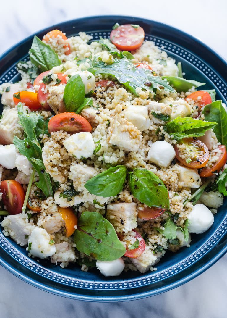 chicken caprese salad with couscous and greens